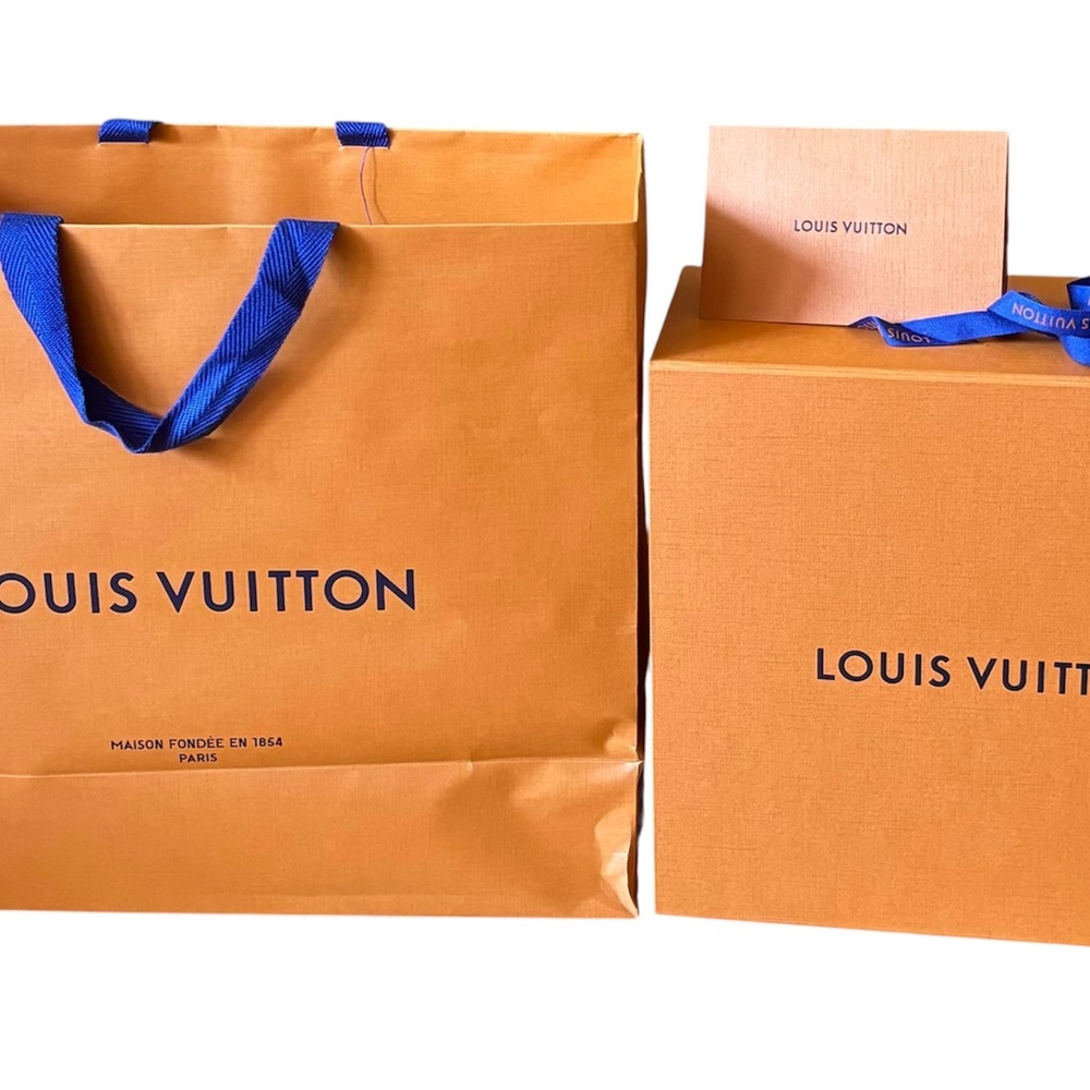 Louis Vuitton box with shopping bag, ribbon and gift envelope